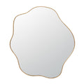 Miroir avec bordure dorée et forme irrégulière